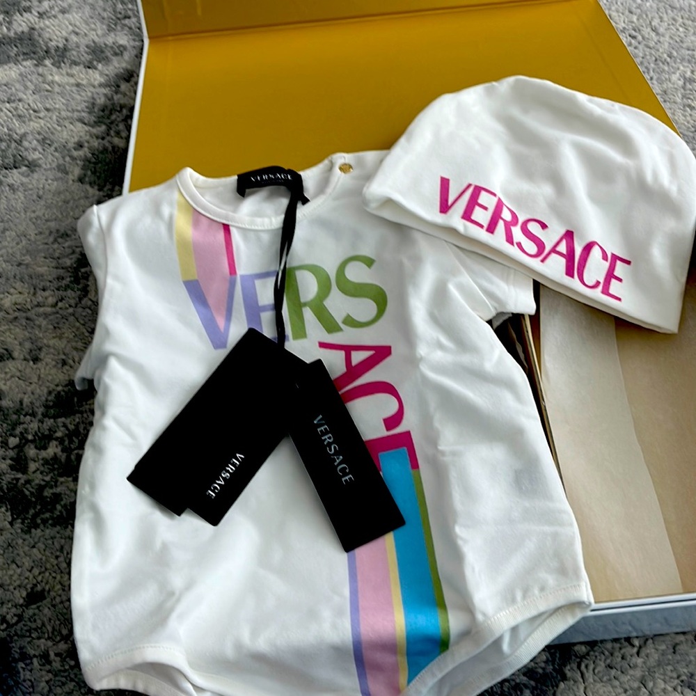 Versace, onesie and hat